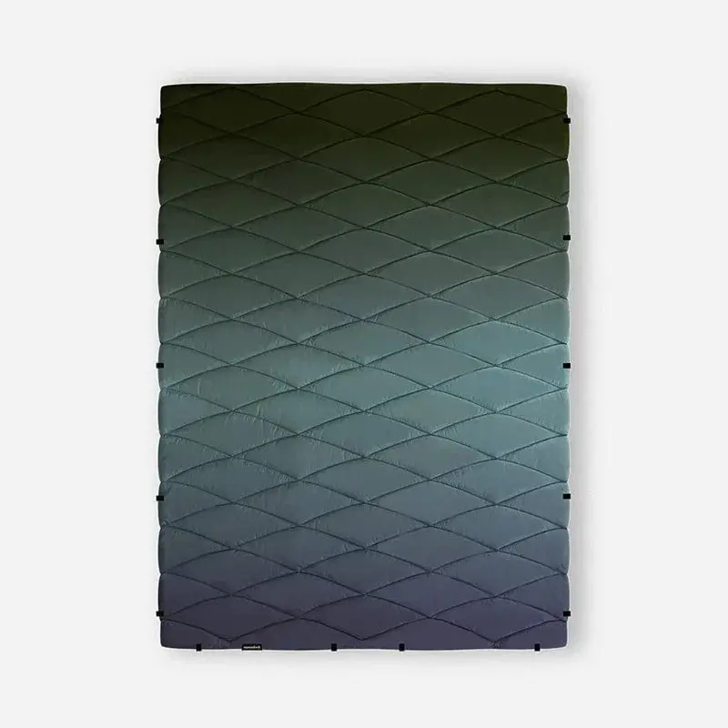 Nomadix Arctic Glow Puffer Blanket – Lightweight Insulated Throw with Cool-Tone Finish