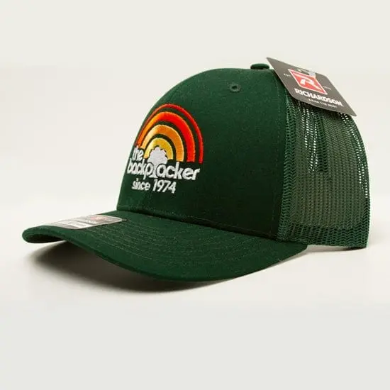 The Backpacker Sunset Logo Mesh Back Hat – Dark Green Trucker Cap