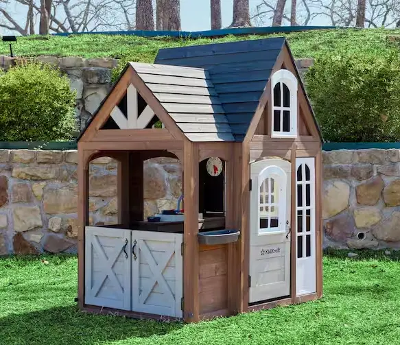 Wooden Outdoor Playhouse Featuring Full Kitchen Area